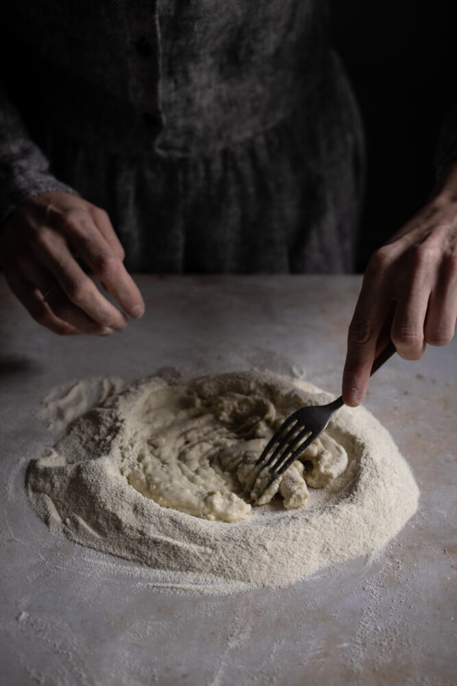 mixing pasta